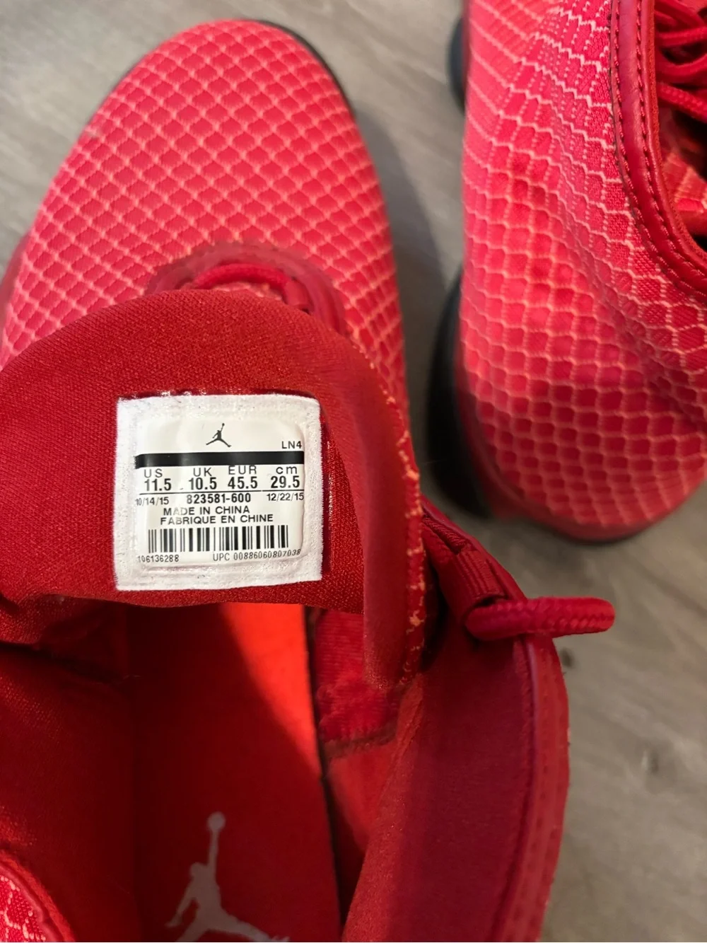 Men’s red high top Jordan sneakers